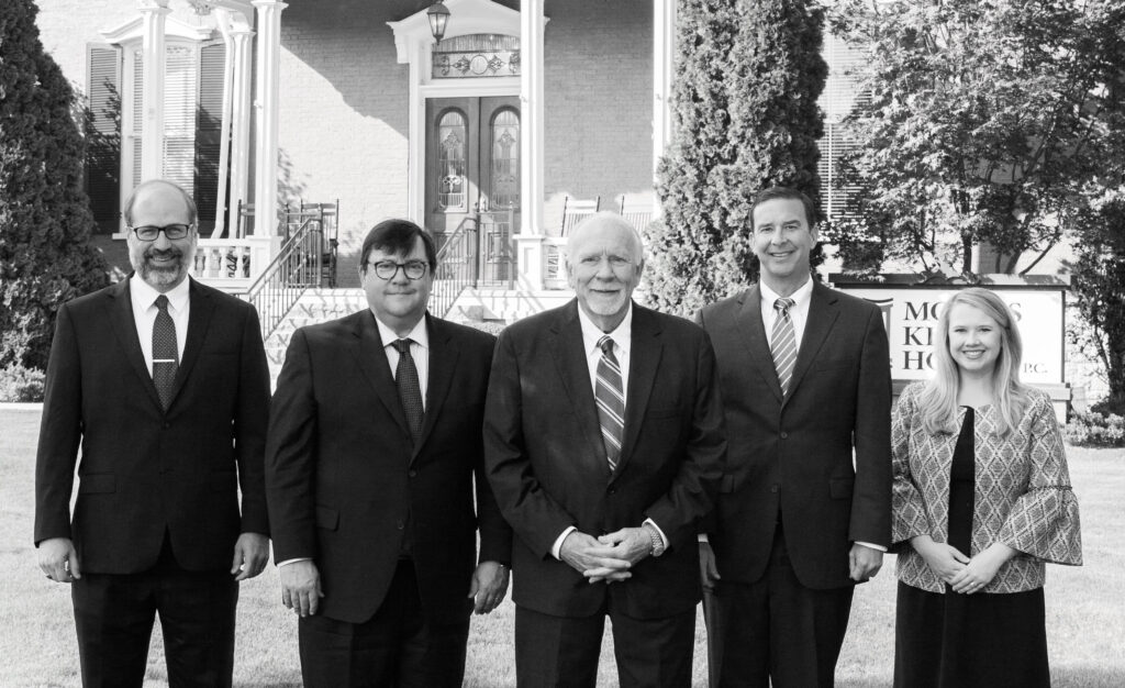 morris king hodge team in front of office building