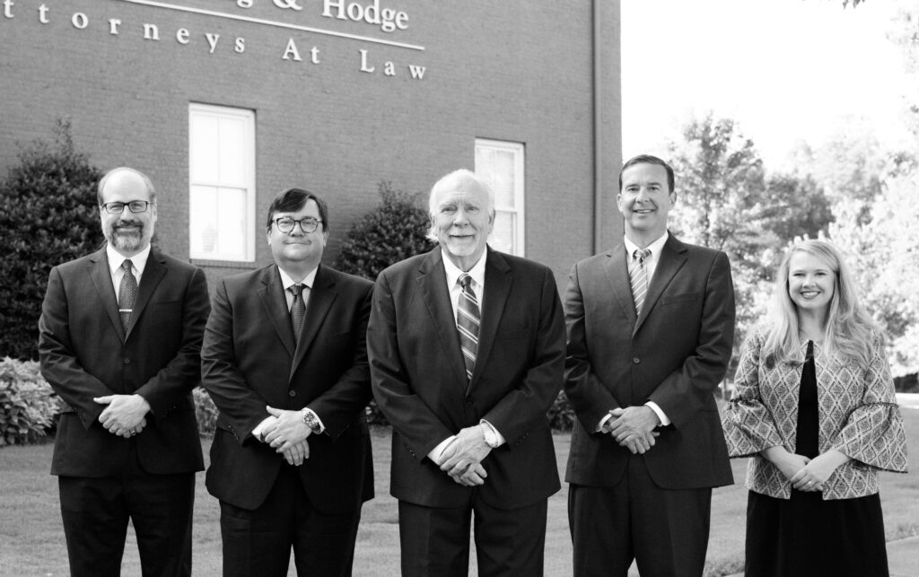 morris king hodge team in front of office building