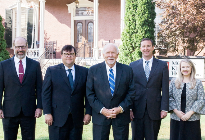 morris king hodge team in front of office building