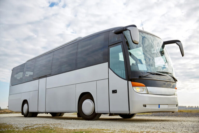 passenger transport - tour bus parked outdoors