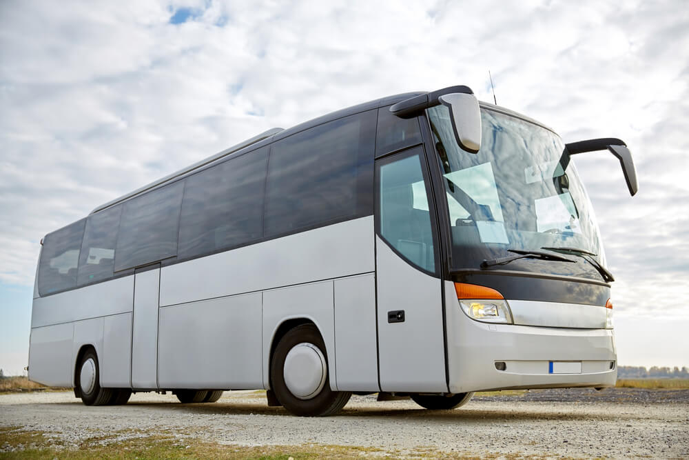 passenger transport - tour bus parked outdoors