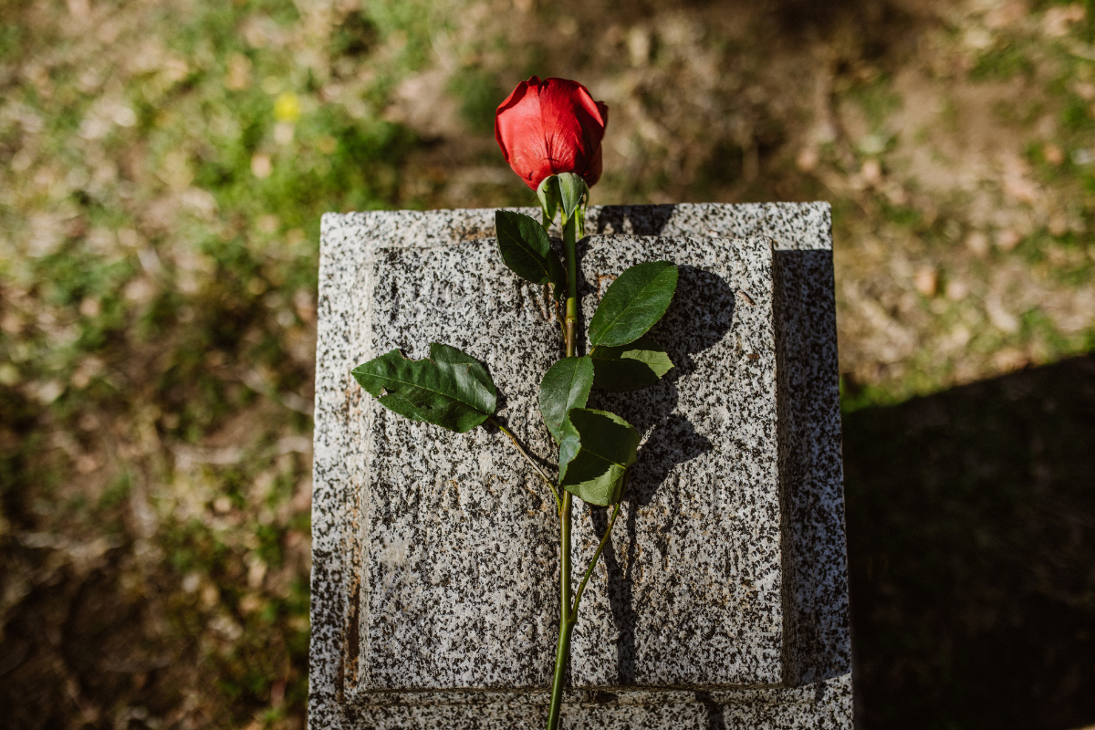 burial monument with rose